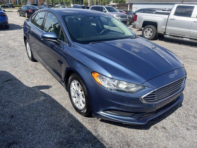 Blue Ford Fusion available for rent