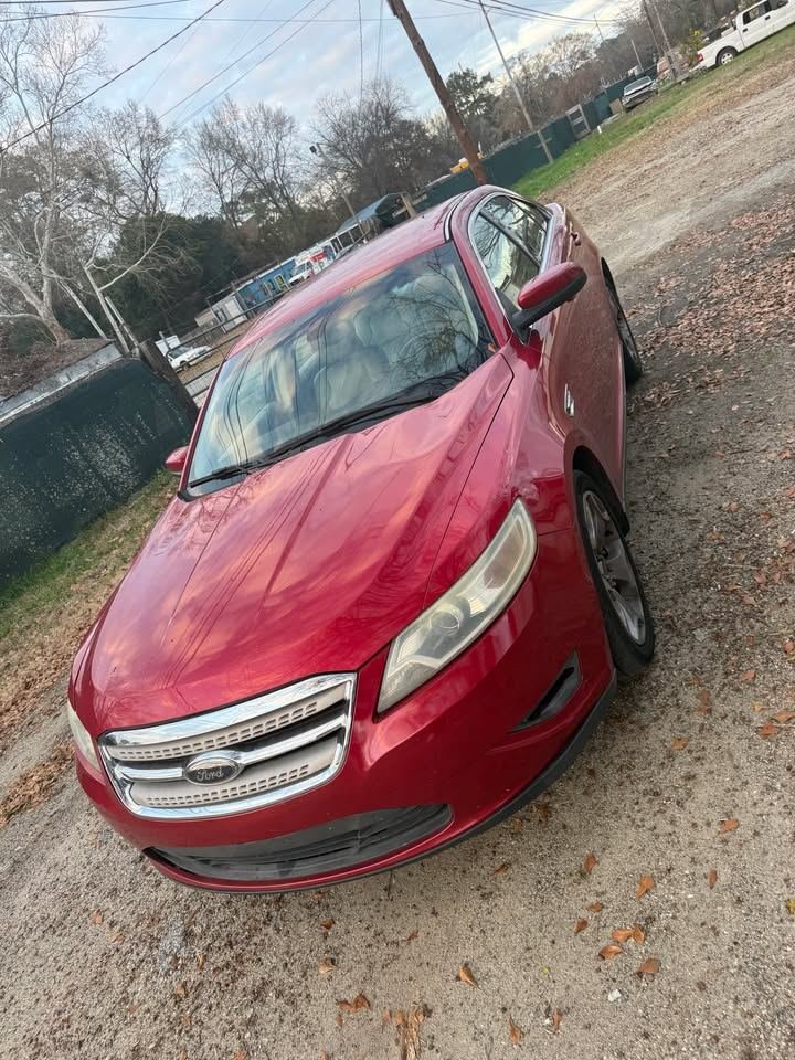 Red Ford Taurus available for rent